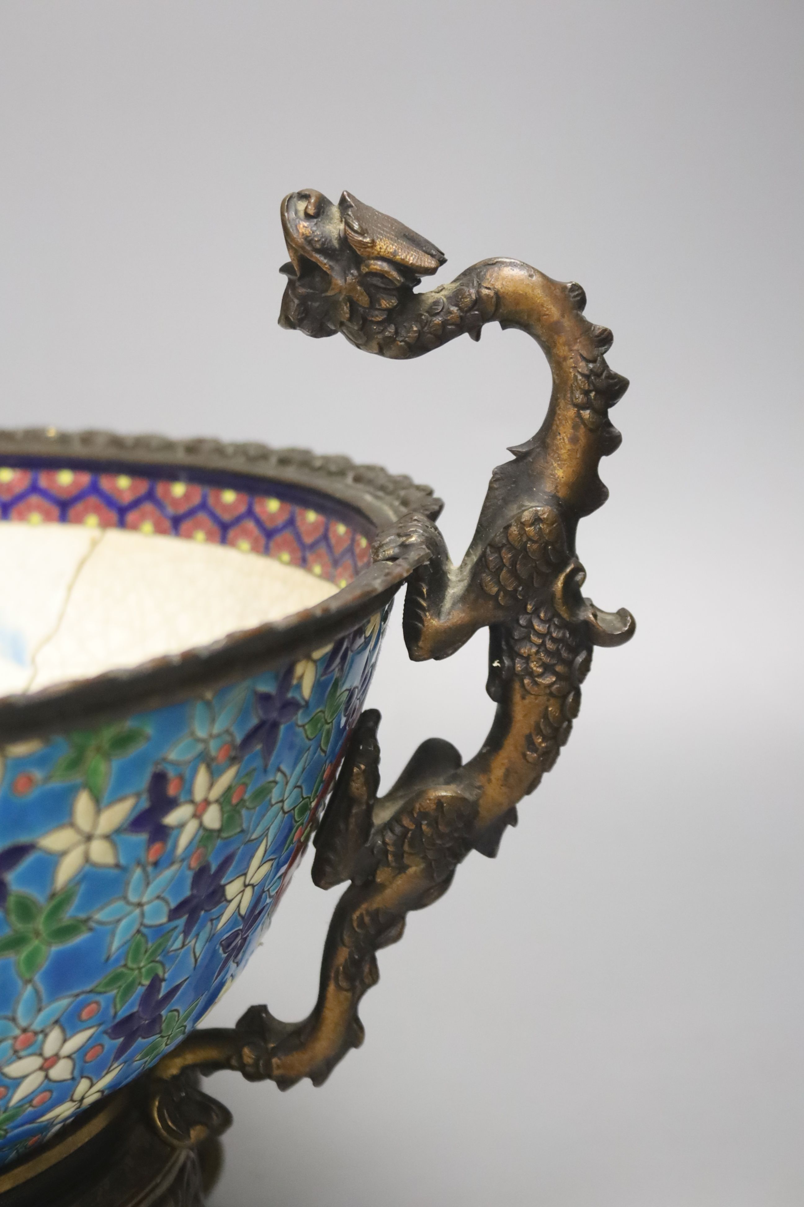 A 19th century French ormolu mounted faience bowl on ornate dragon design stand, 23cm high